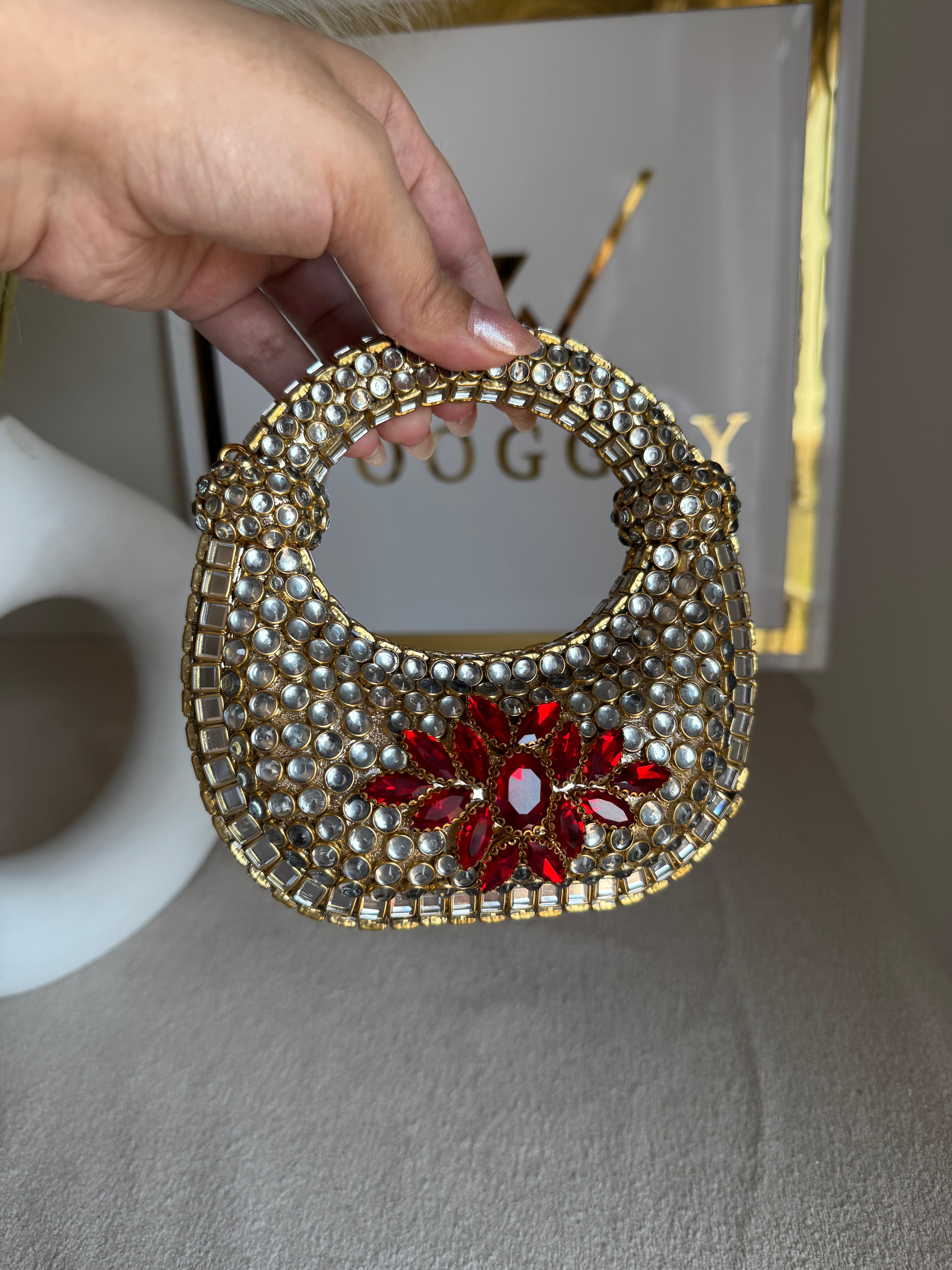 Kundan Classic Moon Clutch with Red Stone Embellishment