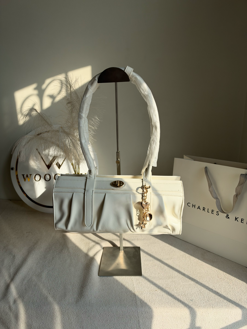 Ruched Shoulder Bag with Heart Charm With C & K Paper Bag - White