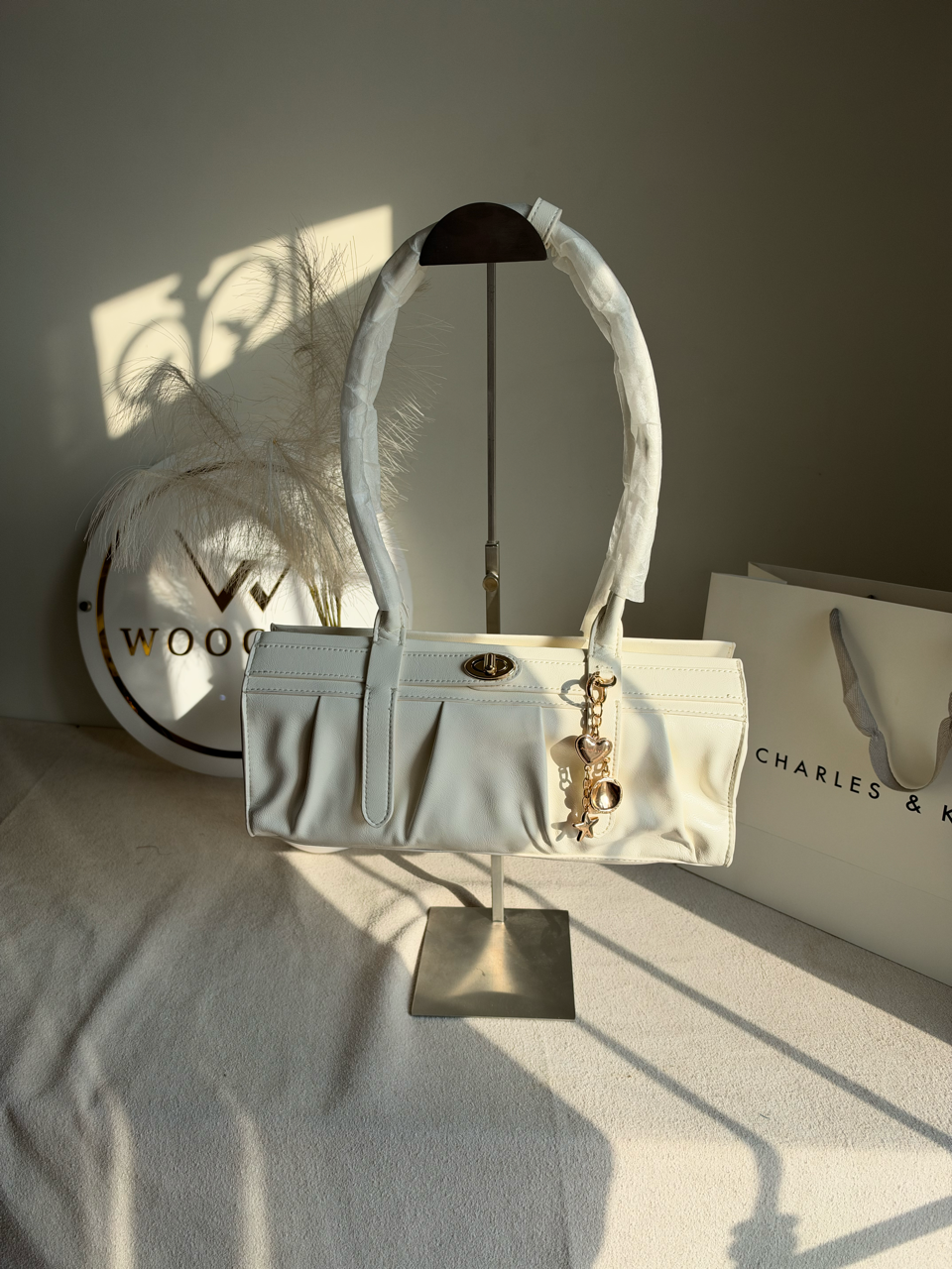 Ruched Shoulder Bag with Heart Charm With C & K Paper Bag - White