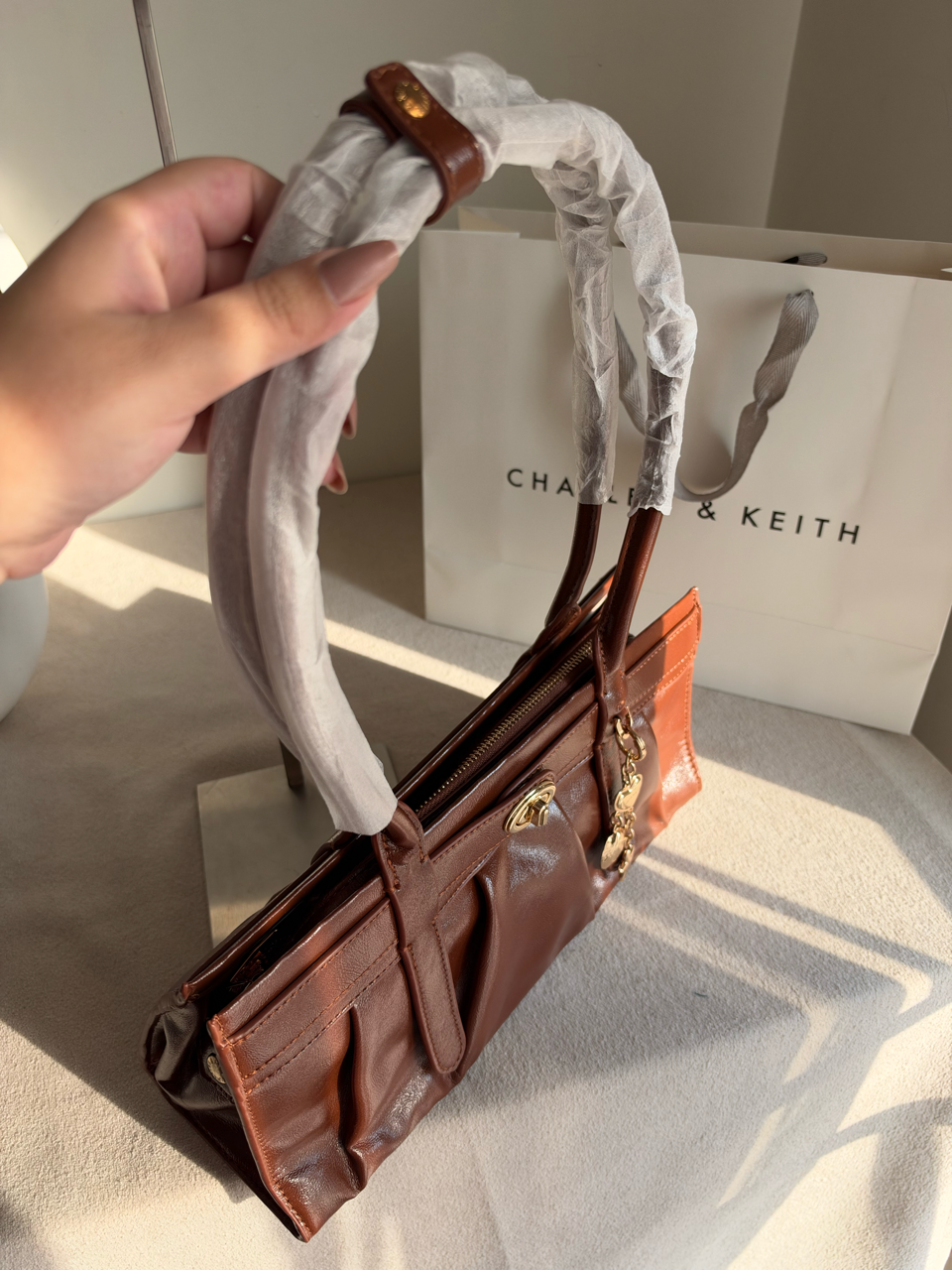 Ruched Shoulder Bag with Heart Charm With C & K Paper Bag - Brown