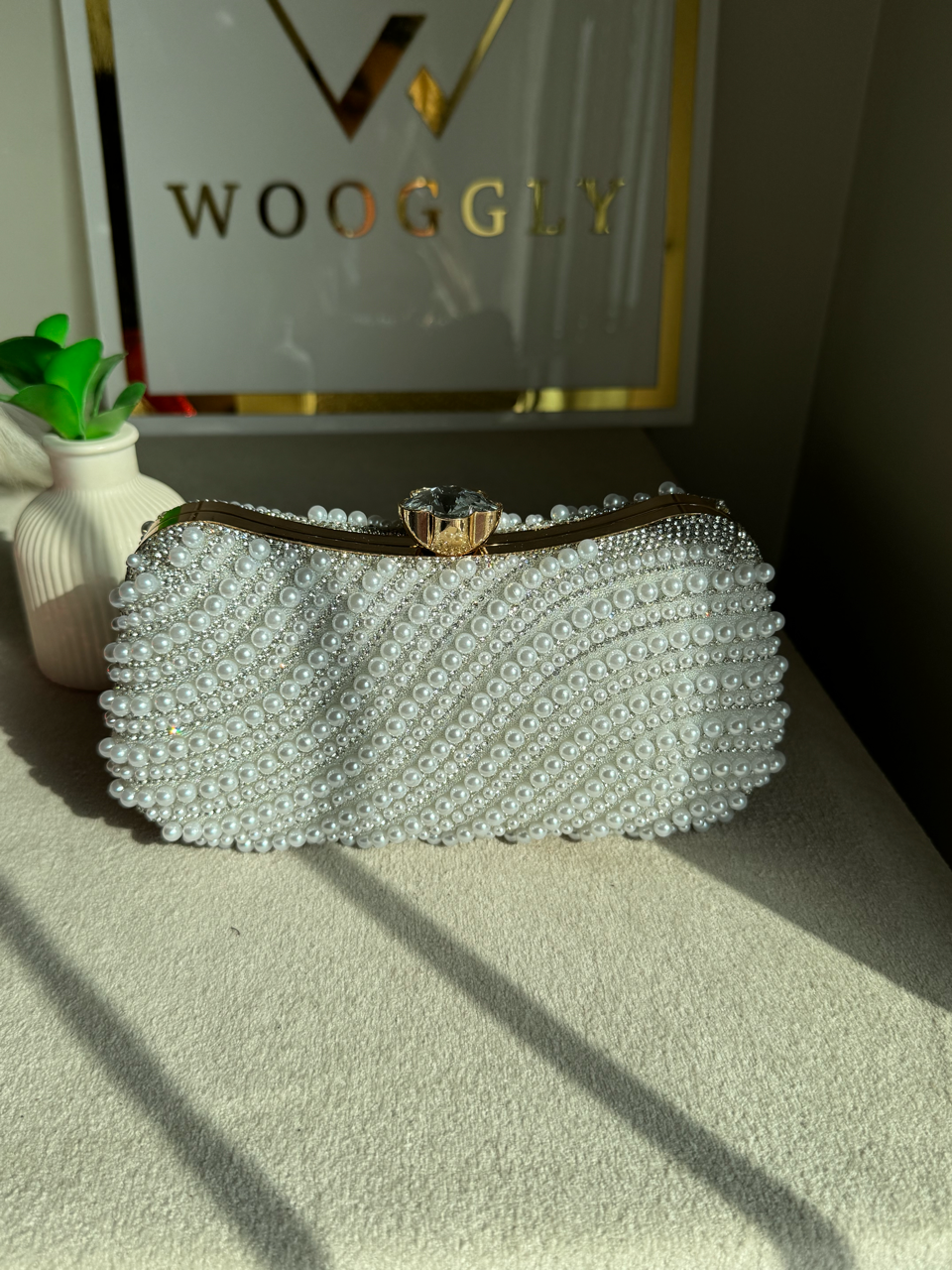 Sleek Pearl Statement Clutch