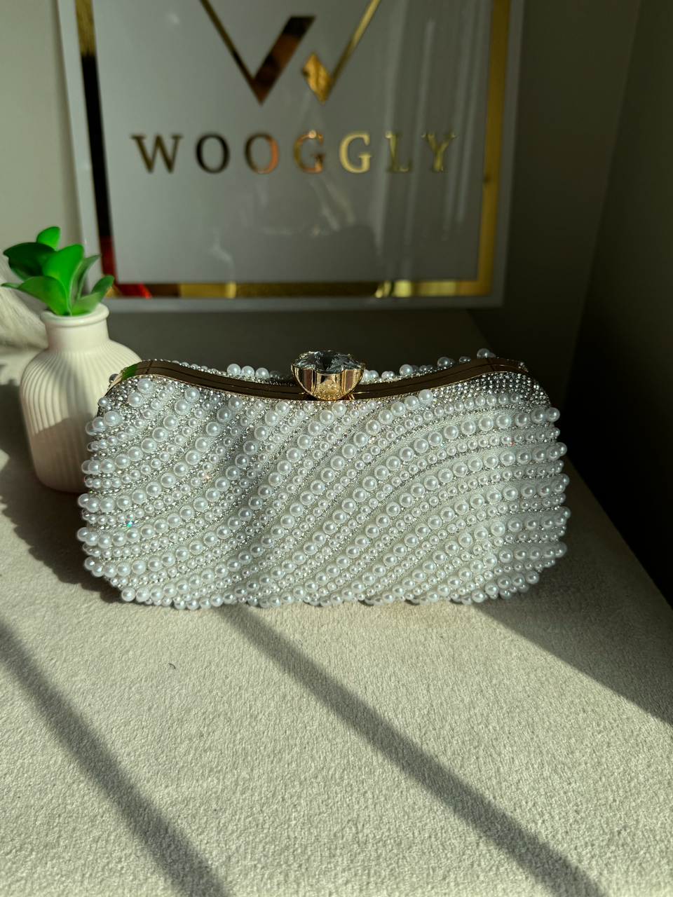 Sleek Pearl Statement Clutch