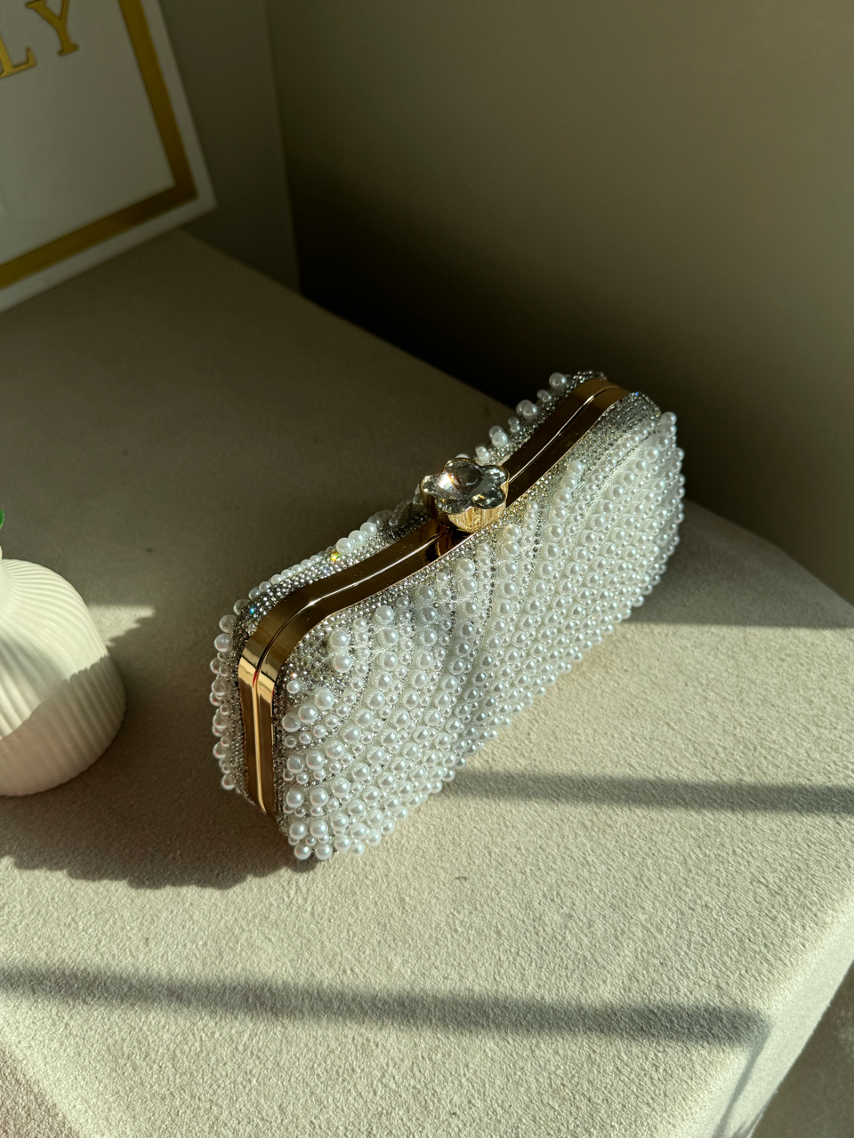 Sleek Pearl Statement Clutch