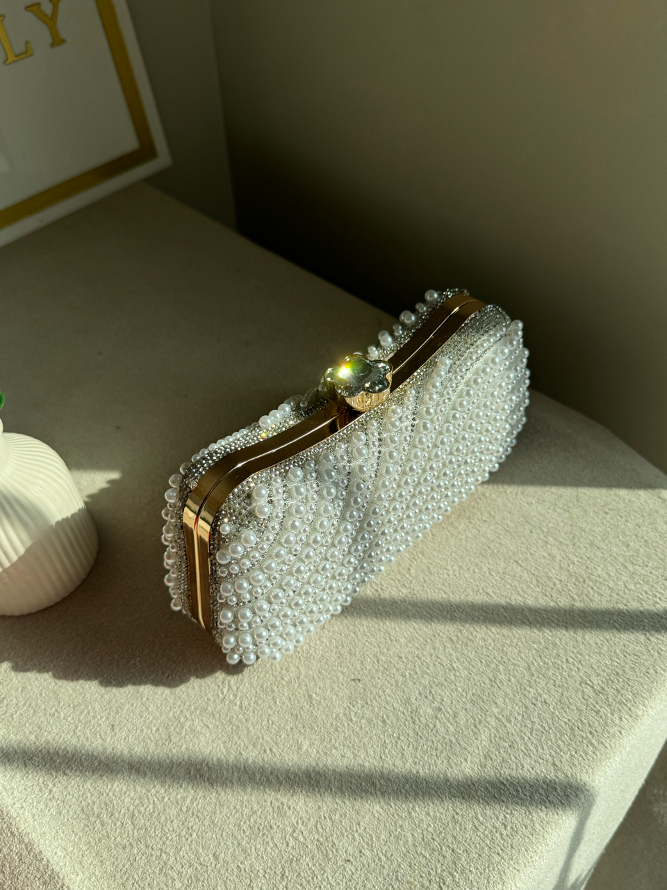 Sleek Pearl Statement Clutch