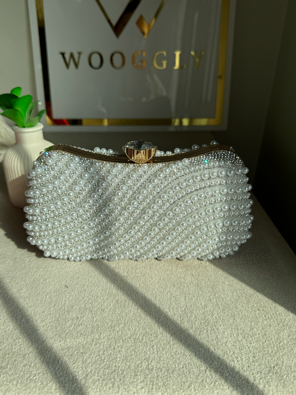 Sleek Pearl Statement Clutch