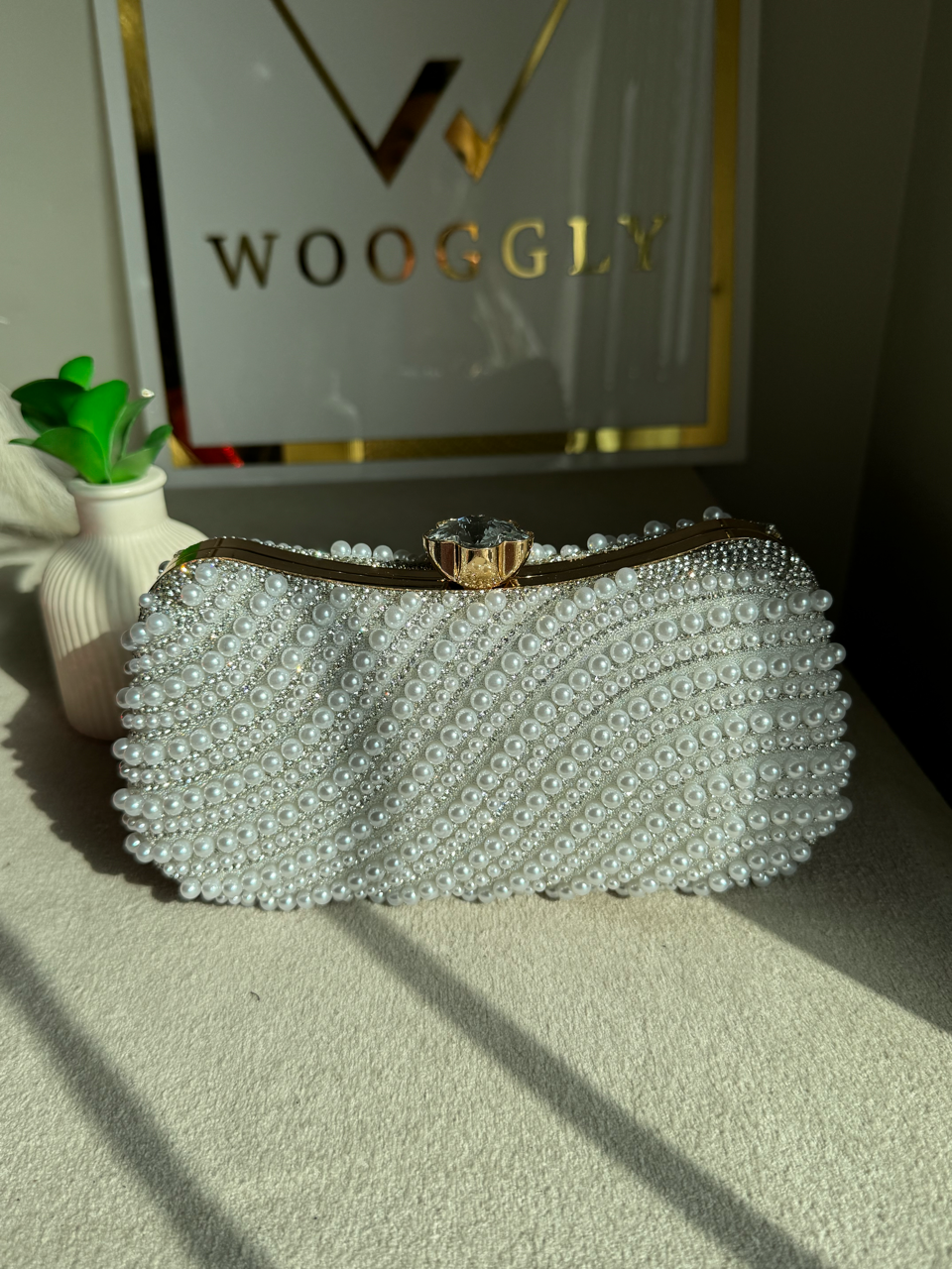 Sleek Pearl Statement Clutch