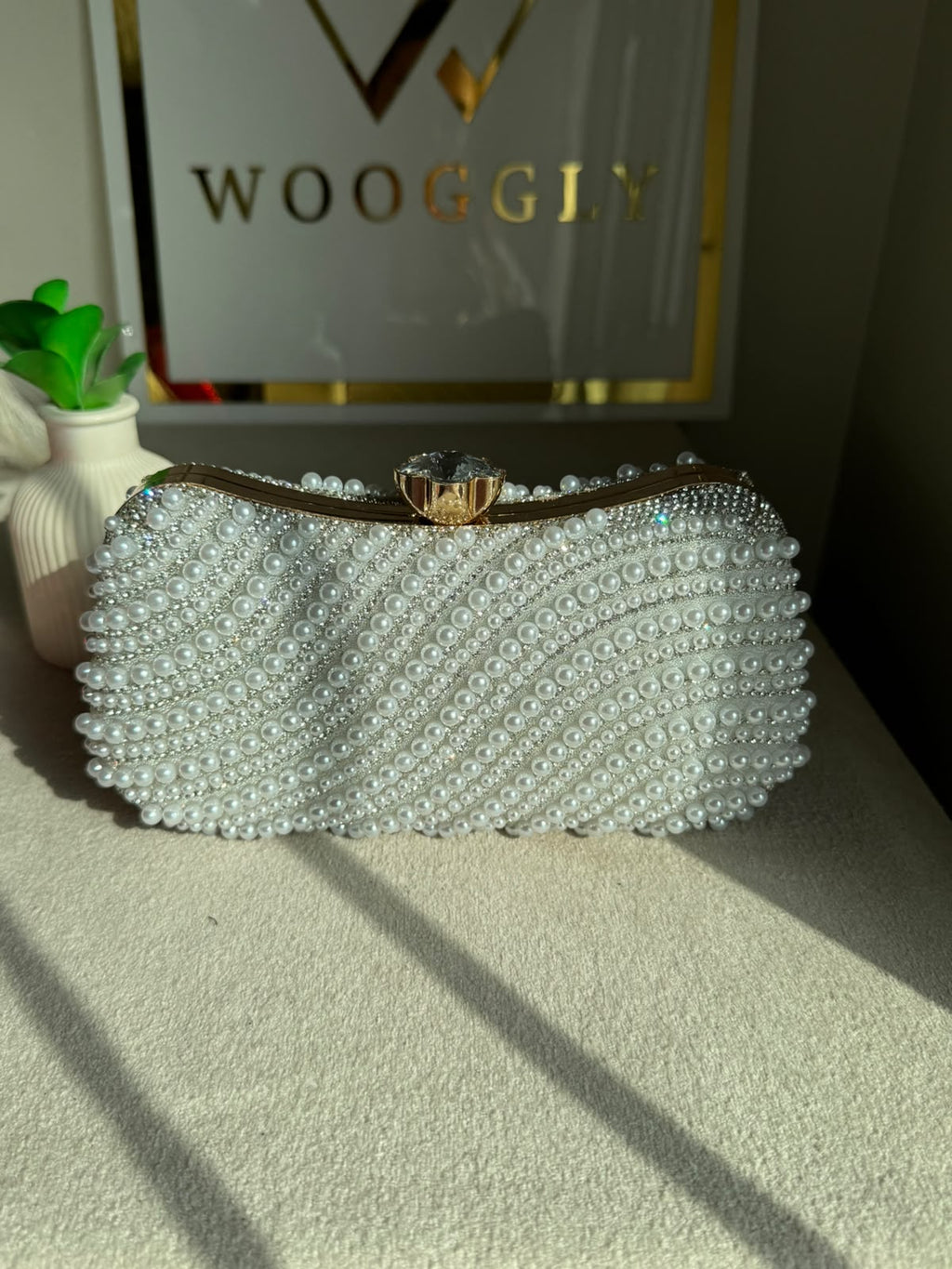 Sleek Pearl Statement Clutch