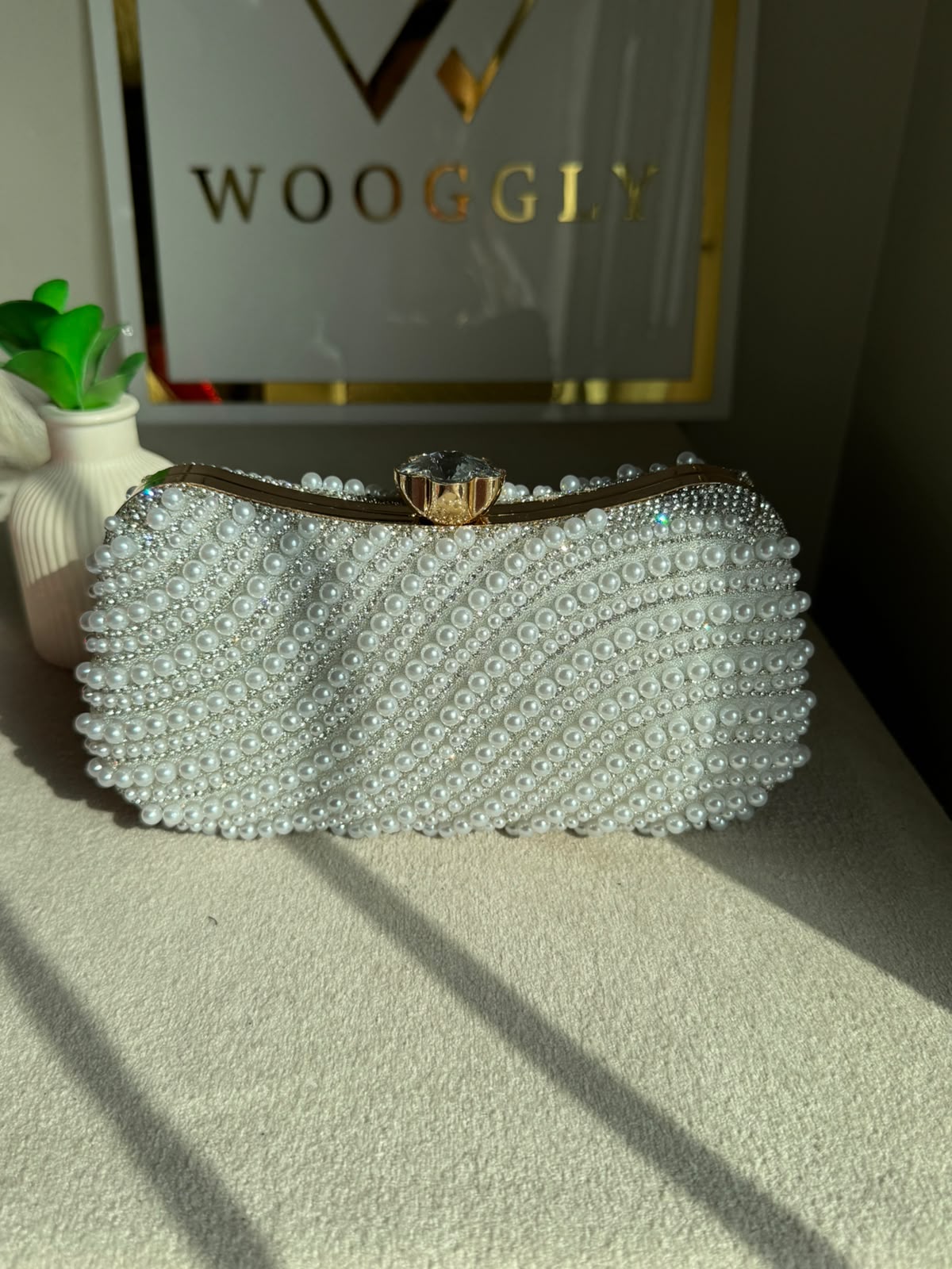 Sleek Pearl Statement Clutch